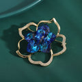 Blue Crystal Camellia Flower Brooch with Gold Tone Outline view 3