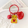 Yellow Heart Duck Keychain with Red Lips and Bell Charms view 1