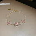 Pink Crystal Butterfly And Flower Bracelet In Gold Or Silver Tone view 6