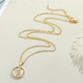 Gold Tone Round Crystal Framed Motif Pendant Necklaces in Nine Designs view 5