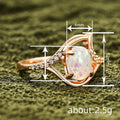 Champagne Gold Open Swirl Frame Oval Faux Opal Ring view 4