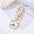Gold Tone Enamel and Crystal Heart Evil Eye Clip Keychains view 5