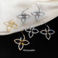 Open Flower Outline Stud Earrings in Gold and Silver view 3