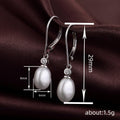 Silver Tone Oval Pearl Lever Back Drop Earrings CZ Accent view 4