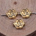 Floral Om Symbol Small-Hole Metal Bead in Two Antique Finishes view 2