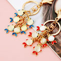 Six Fish Moonstone Keychains in Red and Blue with Assorted and Braided Options view 3
