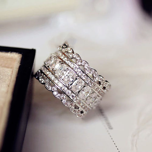 Second product view showing silver-tone square and round clear-stone five-row extra-wide ring