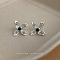 Silver Tone Clear Four Petal Flower And Black Center Stud Earrings view 4