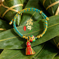 Braided Cord Tassel Charm Bracelets in Eleven Styles view 1
