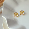Cream Four Petal Flower Round Stud Earrings Gold Rim view 6