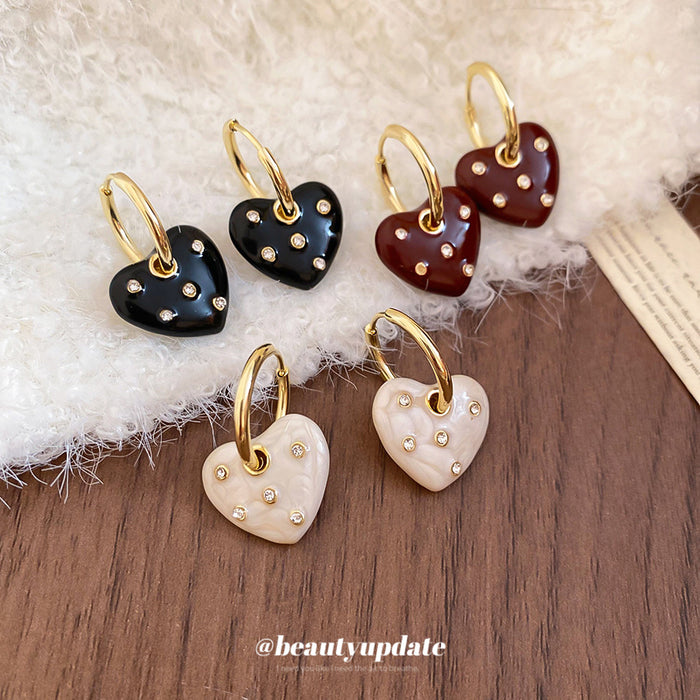 Gold Tone Crystal Heart Drop Huggie Earrings in Two Colors
