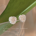 White Pearlized Rose Flower Stud Earrings Carved Bloom Design view 3