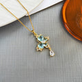 Blue Crystal Butterfly Drop Necklace in Silver Tone or Gold Tone view 7
