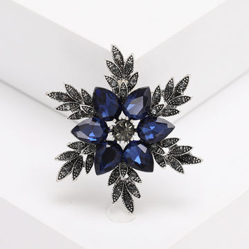 Deep Blue Crystal Flower Cluster Brooch With Dark Leaves