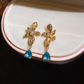 Floral Crystal Teardrop Earrings in Polished Statement Design view 7
