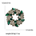 Colorful Crystal Wreath Brooch With Polished Metal And Sculpted Decorative Details view 9