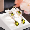 Gold Tone Green Oval Stone Pearl Floral Dangle Earrings view 2
