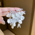White Floral Shell and Pearl Drop Earring Collection view 8