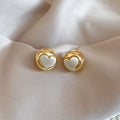 Gold Tone Puffy Heart Stud Earrings with Silver Centers view 6