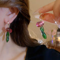 Pink and Green Glass Leaf Cluster Huggie Earrings With Metal Details view 3