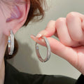 Silver Tone Large Channel Clear CZ Hoop Earrings Pair view 1