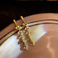 Gold Geometric Hoop Earring Collection with Sculpted Polished Metal Details view 6