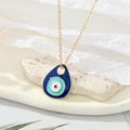 Gold Tone Layered Navy and Aqua Evil Eye Teardrop Earrings view 1