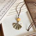 Long Cord Pendant Necklace in Six Wood and Metal Designs view 11