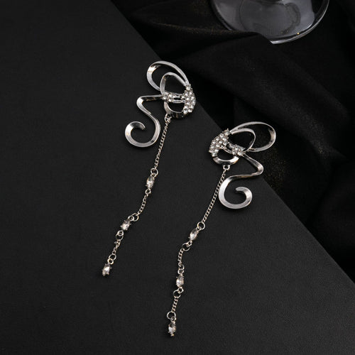 Silver abstract butterfly ribbon earrings with long crystal chain tassels on black