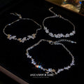 Silver Tone Leaf And Crystal Bracelet With Butterfly Detail view 1