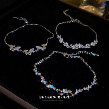 Silver Tone Leaf And Crystal Bracelet With Butterfly Detail