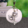 Pearl Wire Flower Pom Pom Keychains in Fifteen Pictured Colors view 6