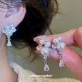 Pearl Cluster Teardrop Dangle Stud Earrings With Polished Metal Details view 2