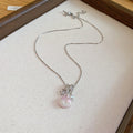 Pink Shell Pendant Necklaces in Three Silver Tone Designs view 8