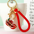 Red and Green Enamel Peanut Keychains with Floral Accents view 4