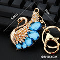 Mixed Rocking Horse Swan Peacock and Cross Keychains in Eight Designs view 8
