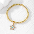 Gold Tone Beaded Crystal Evil Eye Flower Star and Cross Bracelets view 9