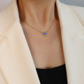 Blue Evil Eye Pendant Necklace Gold Spiked Frame Chain view 4