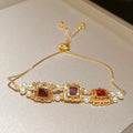 Gold Tone Pearl Flower Adjustable Bracelets Purple Or Red Square view 7