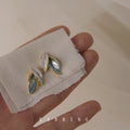 Gold Tone White And Blue Green Leaf Cluster Stud Earrings view 4