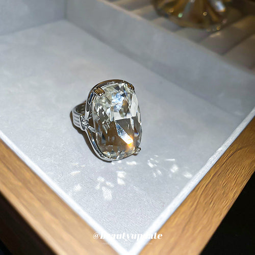 silver-tone oversized clear cushion-rectangle crystal statement ring shown worn in a styled second view