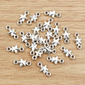 Tiny Double Loop Star Connector Charms in Two Finishes view 3