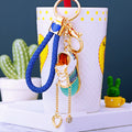 Jelly Sneaker Keychains in Pink and Blue with Four Braided Wrist Loops view 1
