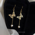 Gold Tone Butterfly Long Chain White Pearl Like Hook Earrings view 3