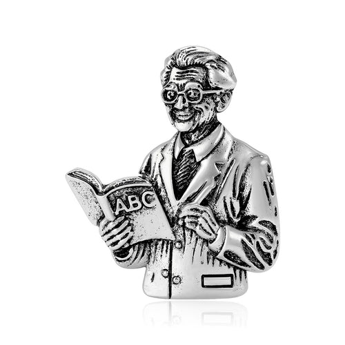 Antique silver teacher ABC book brooch front view on white background