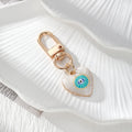 Gold Tone Evil Eye Printed Heart Lobster-Clasp Charms in Six Designs view 6