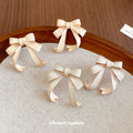 Layered Ribbon Bow Stud Earrings in White or Beige view 2