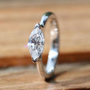 Silver Tone Marquise Solitaire Ring With Clear Stone