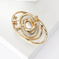Oval Orbit Crystal Brooch in Emerald Green or Navy Blue view 3