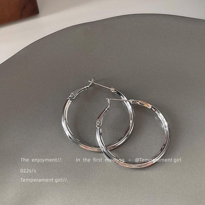 Silver Medium Twisted Hoop Earrings Latch Back Polished